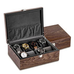 Une boîte Lefiguet de 10 compartiments pour montres s'ouvre pour révéler plusieurs montres élégantes soigneusement disposées dans des compartiments rembourrés.