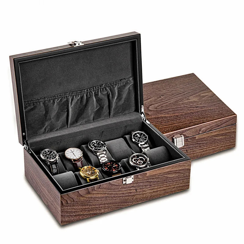 Une boîte à montres Boites Lefiguet ouverte pour exposer plusieurs montres de styles et de designs variés.