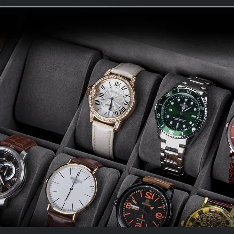 Une collection de montres de luxe Boites Lefiguet présentées dans un coffret à montres en bois, comprenant des modèles avec des bracelets en or, cuir et métal.