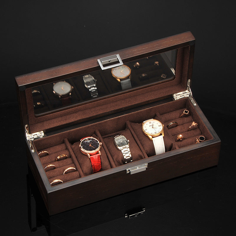 Une boîte à montres en bois Boites Lefiguet contenant plusieurs montres Boite A Montre Femme.