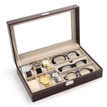 Une boîte Coffret Range Montre et Lunettes en cuir marron remplie de lunettes et de montres Boites Lefiguet.