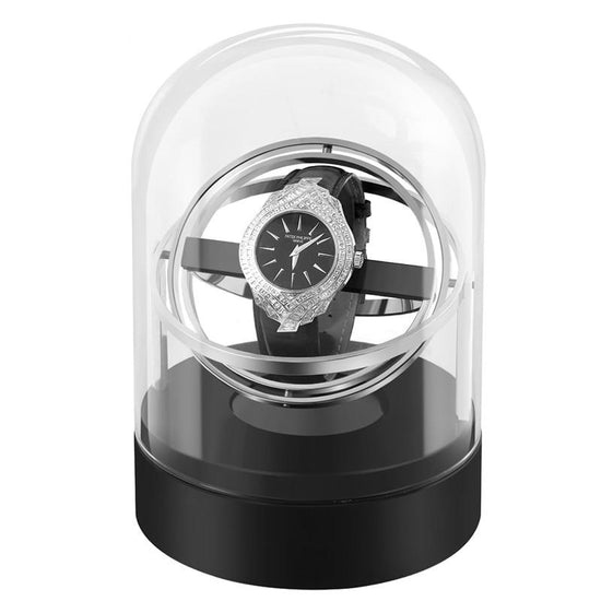Une montre remontoir gyroscopique surmontée d'un dôme en verre fabriquée par Boites Lefiguet.