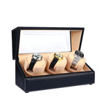 Un groupe de montres Remontoir Montre Cuir Noir 3 Slots dans une boîte Boites Lefiguet.