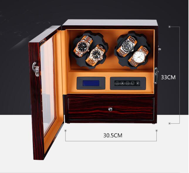 Un remontoir de montre en bois Boites Lefiguet avec quatre montres Remontoir Montre automatique Laqué avec Tiroir.