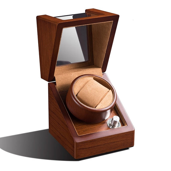 Un remontoir de montre en bois Boites Lefiguet avec une montre Remontoir En Bois Et Velours Marron Et Beige.