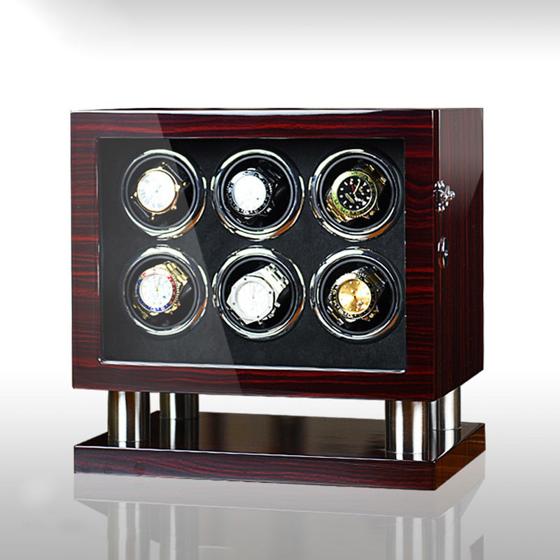 A Boites Lefiguet Remontoir Montre Mécanique 6 emplacements avec six montres dessus.