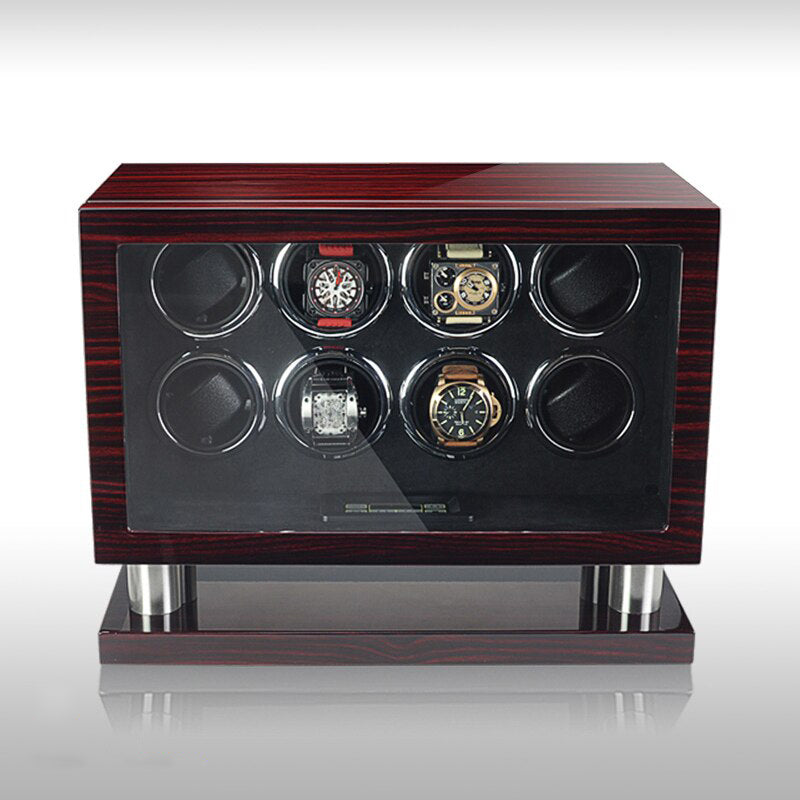 Un Remontoir Montre Mécanique 8 fentes par Boites Lefiguet avec cinq montres en elle.