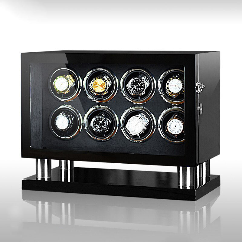 Un remontoir de montre Remontoir Montre Méchanique noir avec six montres Boites Lefiguet dessus.