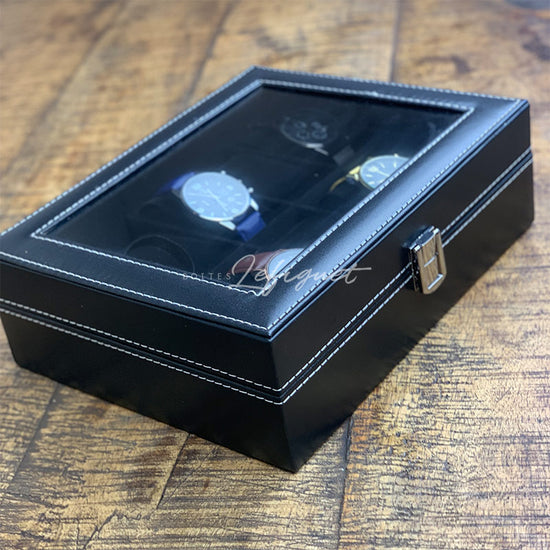 Un remontoir de montre Boîte à Montre Simili Cuir Noir 10 Slots avec trois montres Boites-lefiguet.com dedans.